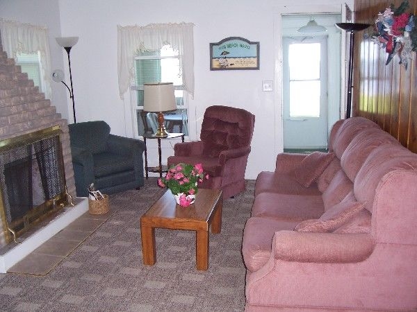 Beach House cottage sitting room and fireplace
